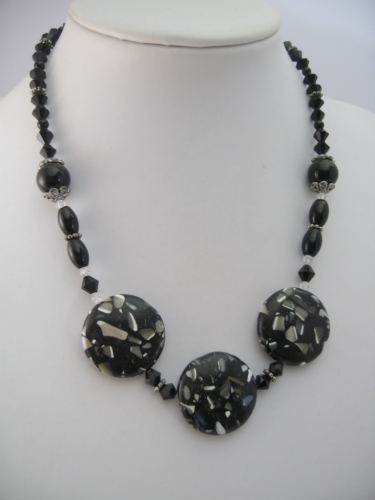 Black/grey Necklace with 3 amulets