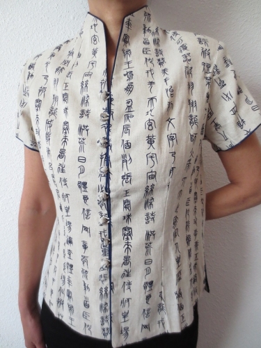 White with old chinese writing M